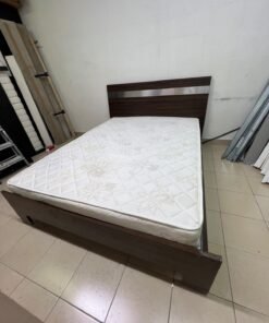 A dark brown wooden double bed featuring a headboard accented with a silver metal strip, and equipped with a white padded mattress. - Image 6