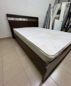 A dark brown wooden double bed featuring a headboard accented with a silver metal strip, and equipped with a white padded mattress. - Image 7