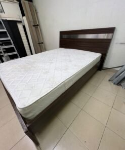 A dark brown wooden double bed featuring a headboard accented with a silver metal strip, and equipped with a white padded mattress. - Image 11