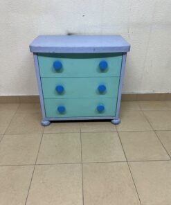 The IKEA "Mammut" chest of drawers features a classic (vintage) design and a color blending blue and teal; it is specially designed for children's rooms.