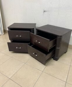 Two dark brown wooden bedside tables (nightstands) featuring two drawers and curved corners, accented with contrasting white stitching and silver-colored metal drawer handles. - Image 3