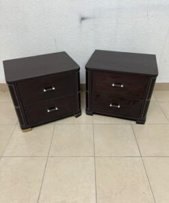 Two dark brown wooden bedside tables (nightstands) featuring two drawers and curved corners, accented with contrasting white stitching and silver-colored metal drawer handles. - Image 5