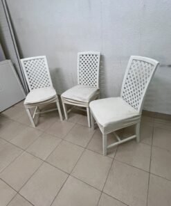 A set of white wooden chairs featuring a woven-mesh backrest design and white seat covers. - Image 8