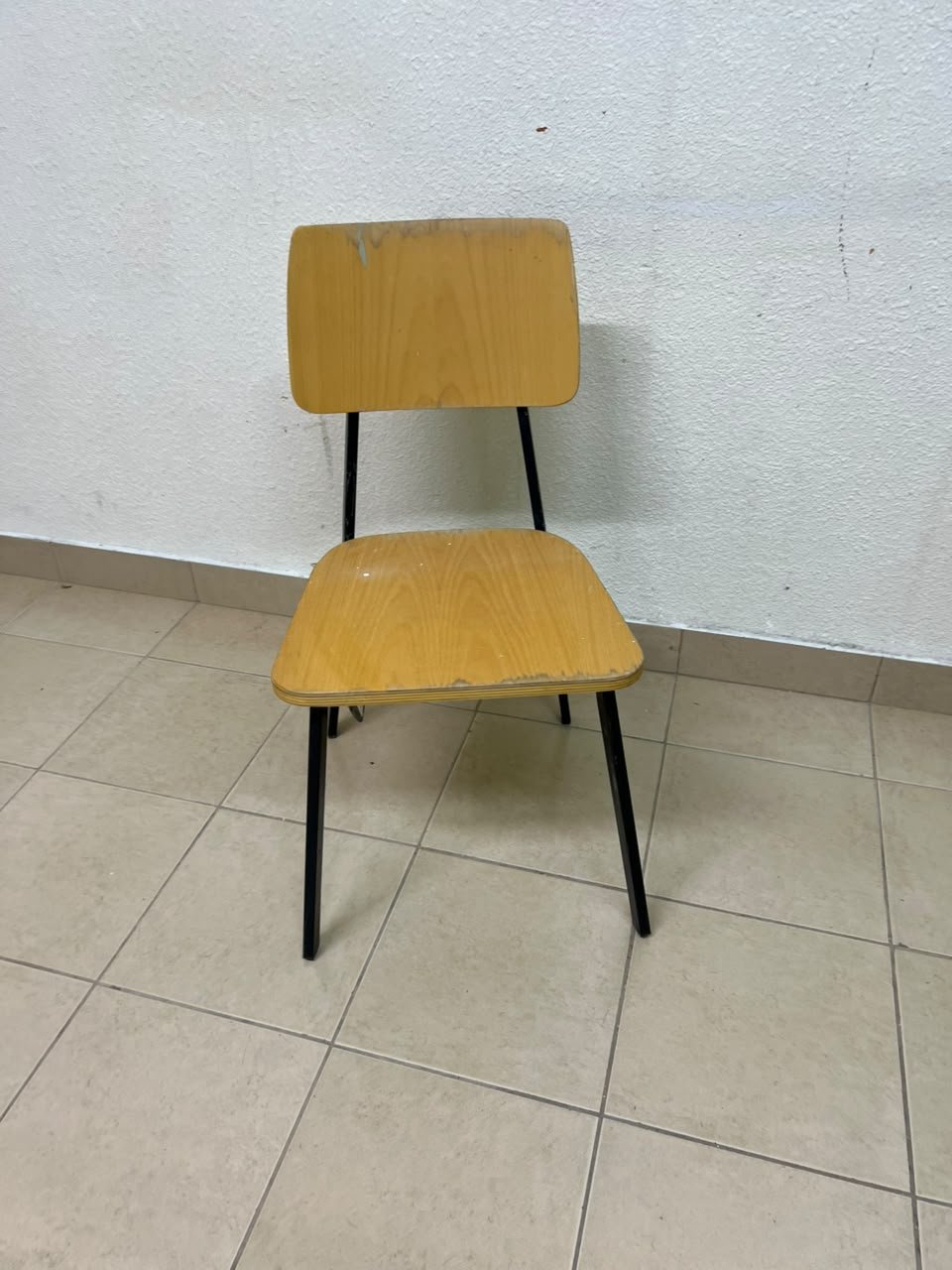 Classic school chair featuring a plywood seat and backrest, and a black metal frame. - Image 6