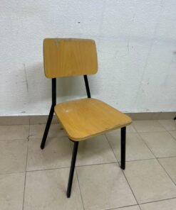 Classic school chair featuring a plywood seat and backrest, and a black metal frame.