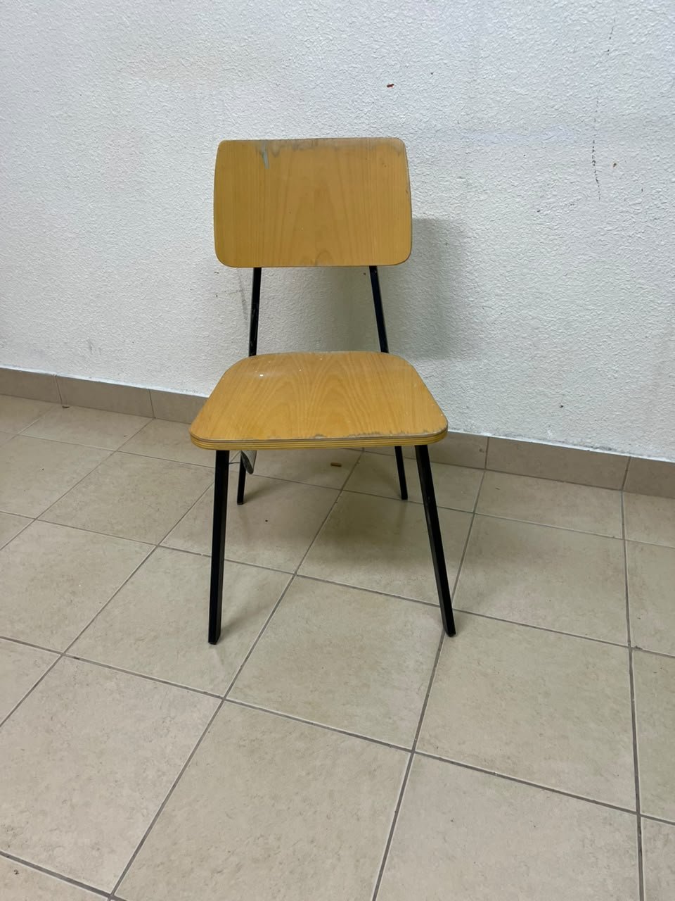 Classic school chair featuring a plywood seat and backrest, and a black metal frame. - Image 8