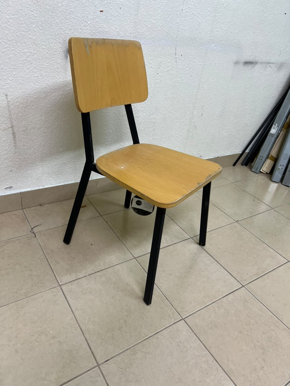 Classic school chair featuring a plywood seat and backrest, and a black metal frame. - Image 9
