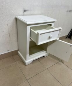 A white side table or nightstand featuring a traditional, classic design, comprising an upper drawer and a lower cabinet with a door, both fitted with round wooden knobs. - Image 5