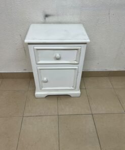 A white side table or nightstand featuring a traditional, classic design, comprising an upper drawer and a lower cabinet with a door, both fitted with round wooden knobs. - Image 11