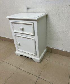 A white side table or nightstand featuring a traditional, classic design, comprising an upper drawer and a lower cabinet with a door, both fitted with round wooden knobs. - Image 8