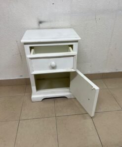A white side table or nightstand featuring a traditional, classic design, comprising an upper drawer and a lower cabinet with a door, both fitted with round wooden knobs. - Image 7