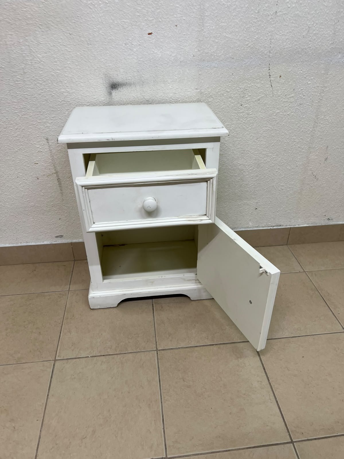 A white side table or nightstand featuring a traditional, classic design, comprising an upper drawer and a lower cabinet with a door, both fitted with round wooden knobs. - Image 7