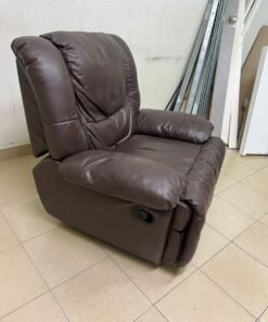 A brown faux leather single recliner featuring padded armrests and backrest, and a manual side handle for position control. - Image 10