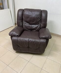 A brown faux leather single recliner featuring padded armrests and backrest, and a manual side handle for position control. - Image 8