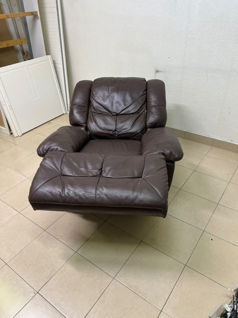 A brown faux leather single recliner featuring padded armrests and backrest, and a manual side handle for position control. - Image 5