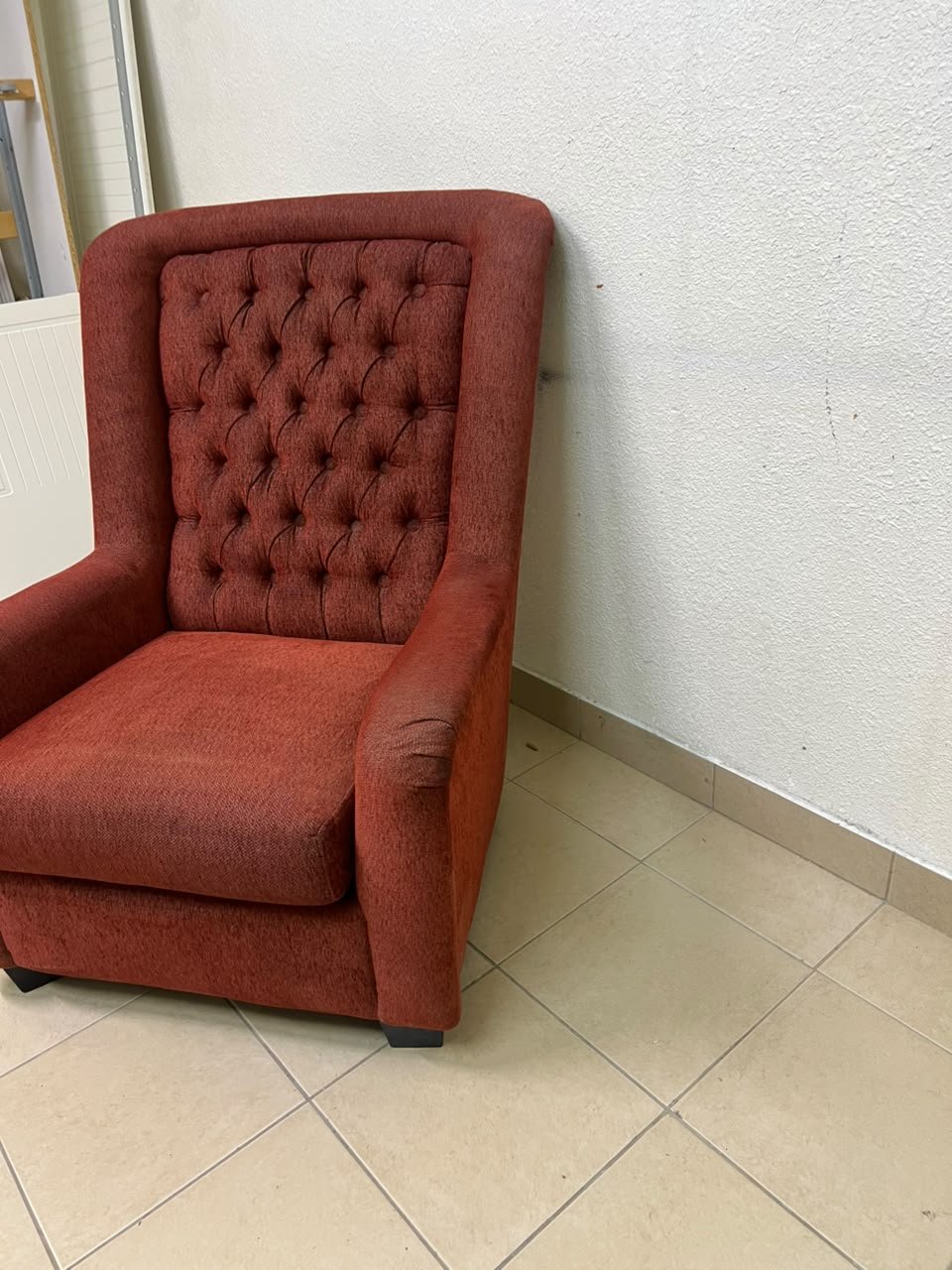 A classic-style armchair featuring a high, button-tufted backrest, upholstered in textured dark red fabric, and accented with metal nailhead trim along the edges. - Image 6