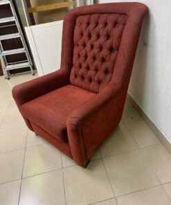 A classic-style armchair featuring a high, button-tufted backrest, upholstered in textured dark red fabric, and accented with metal nailhead trim along the edges. - Image 5