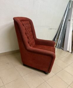 A classic-style armchair featuring a high, button-tufted backrest, upholstered in textured dark red fabric, and accented with metal nailhead trim along the edges. - Image 9