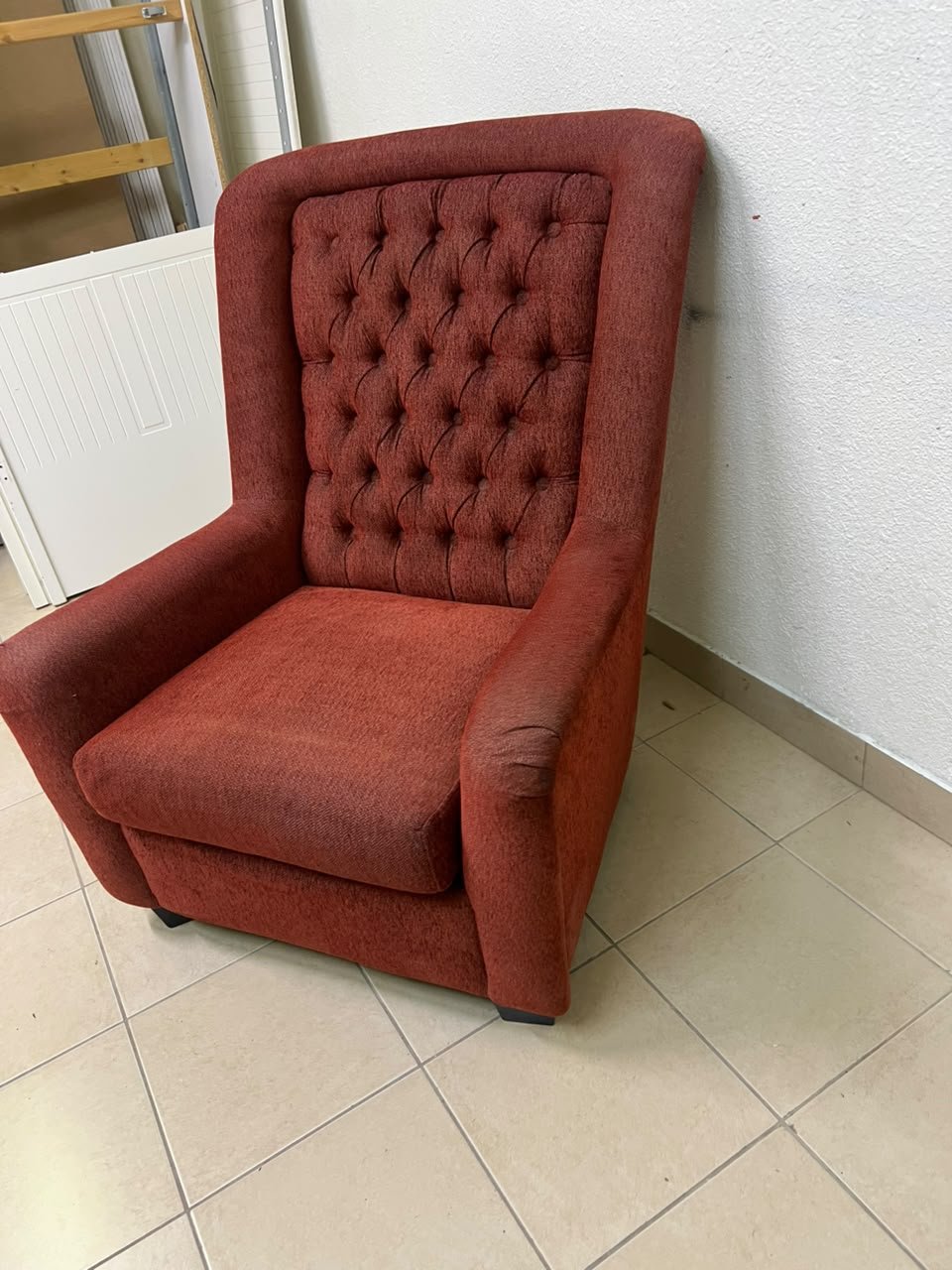 A classic-style armchair featuring a high, button-tufted backrest, upholstered in textured dark red fabric, and accented with metal nailhead trim along the edges. - Image 10
