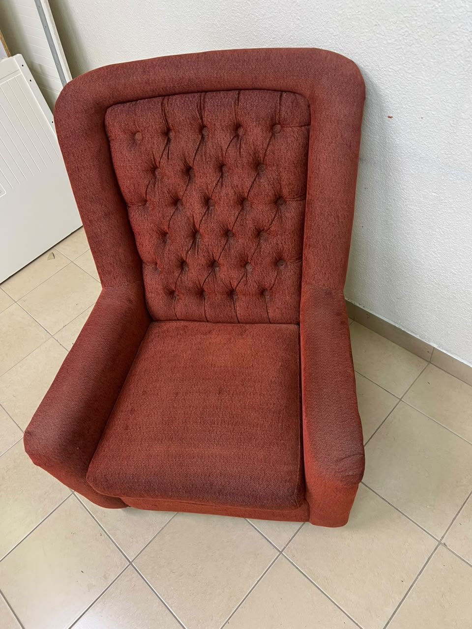A classic-style armchair featuring a high, button-tufted backrest, upholstered in textured dark red fabric, and accented with metal nailhead trim along the edges. - Image 11