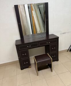 The image shows a brown wooden vanity table with an attached mirror and multiple drawers. - Image 2