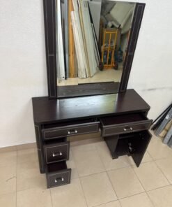 The image shows a brown wooden vanity table with an attached mirror and multiple drawers. - Image 3