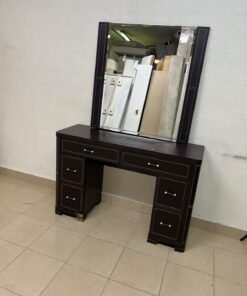 The image shows a brown wooden vanity table with an attached mirror and multiple drawers. - Image 5
