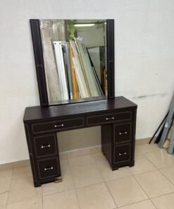 The image shows a brown wooden vanity table with an attached mirror and multiple drawers. - Image 6