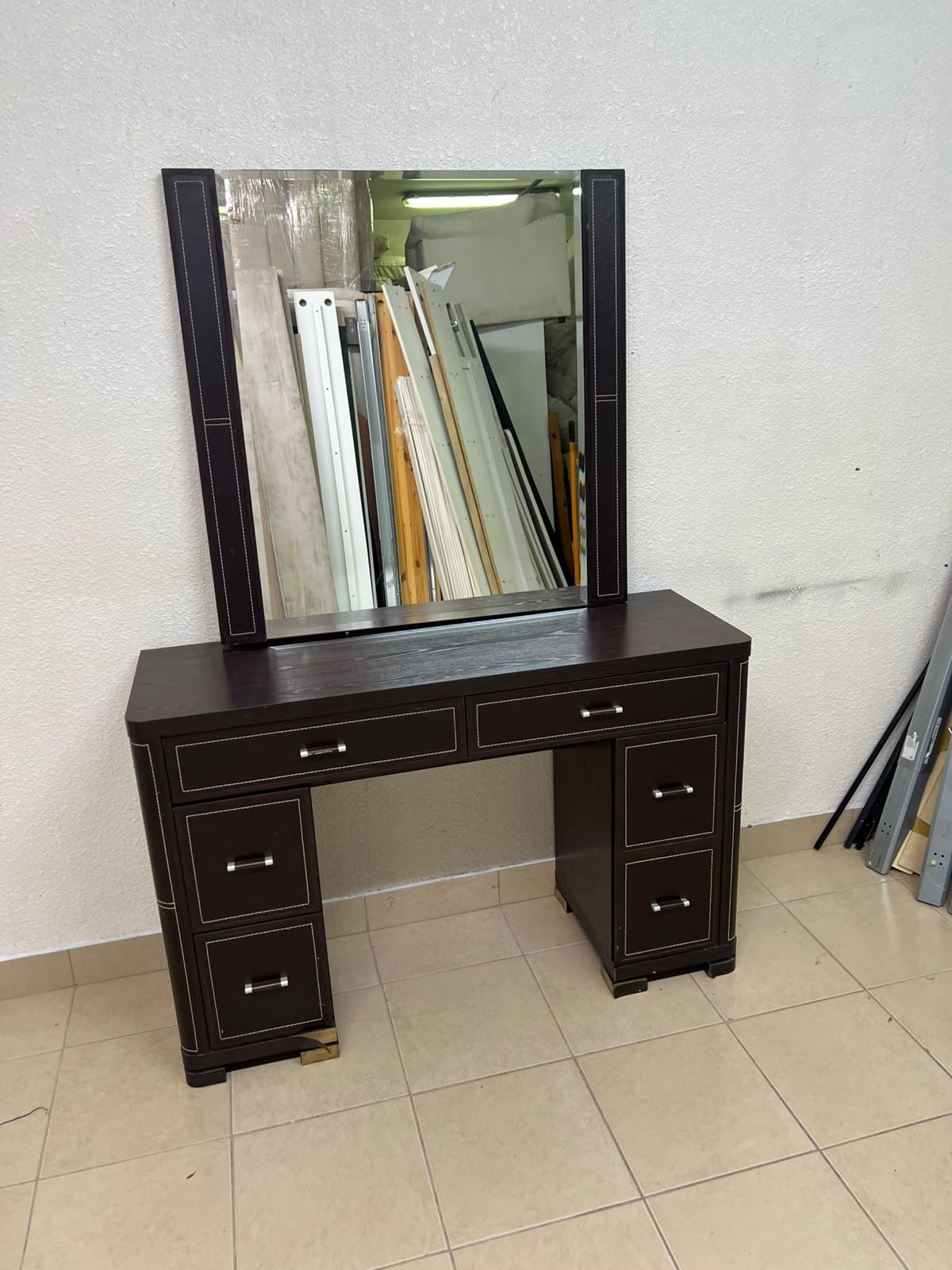 The image shows a brown wooden vanity table with an attached mirror and multiple drawers. - Image 6