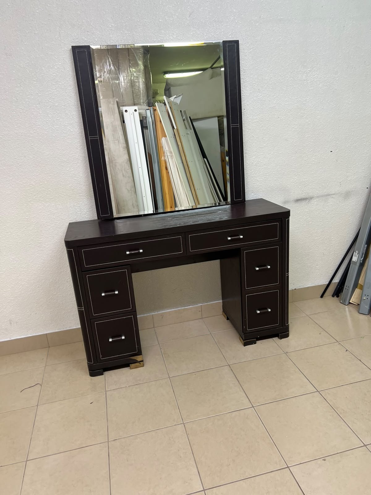 The image shows a brown wooden vanity table with an attached mirror and multiple drawers. - Image 16