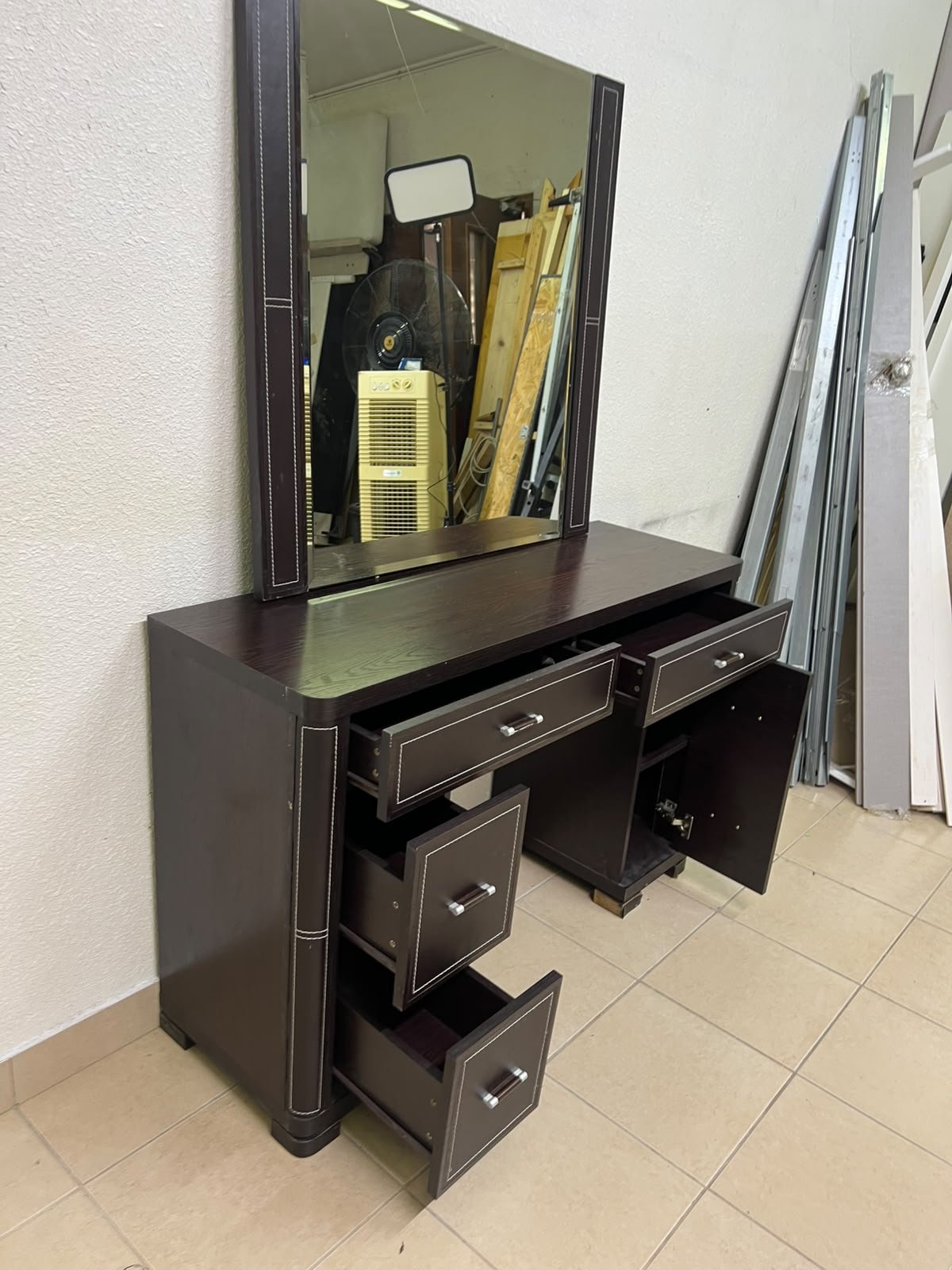 The image shows a brown wooden vanity table with an attached mirror and multiple drawers. - Image 14