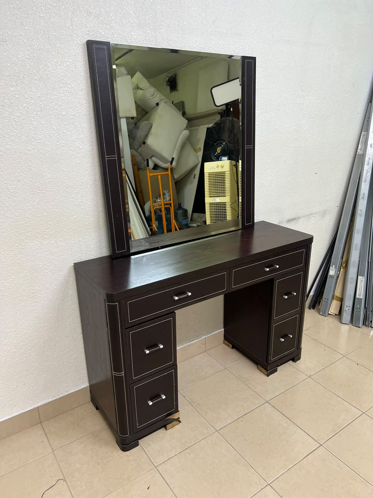 The image shows a brown wooden vanity table with an attached mirror and multiple drawers. - Image 13