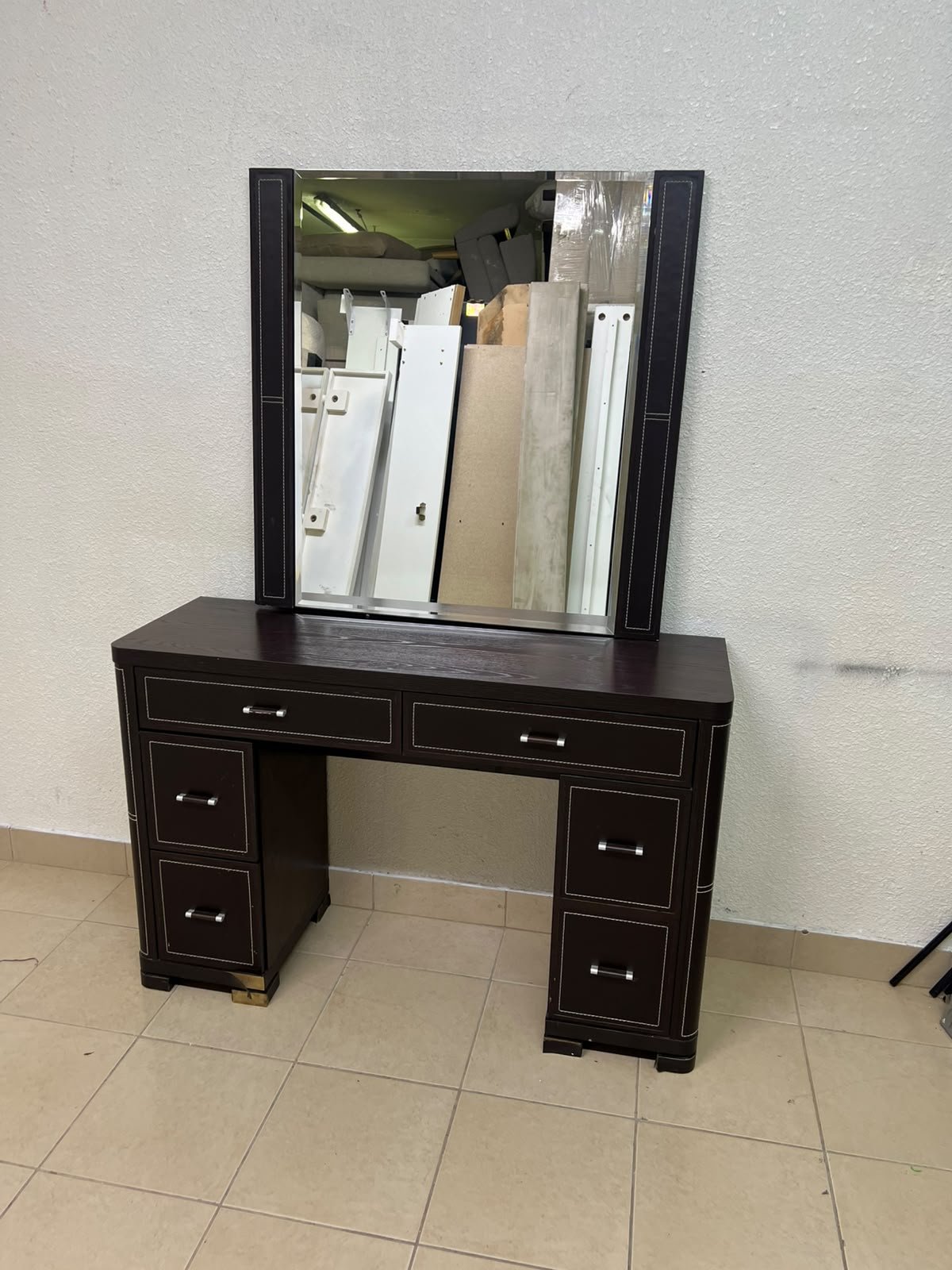 The image shows a brown wooden vanity table with an attached mirror and multiple drawers. - Image 12