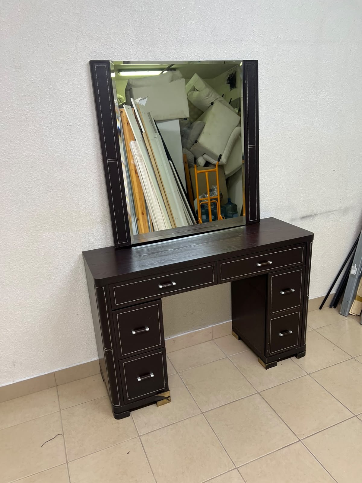 The image shows a brown wooden vanity table with an attached mirror and multiple drawers. - Image 11