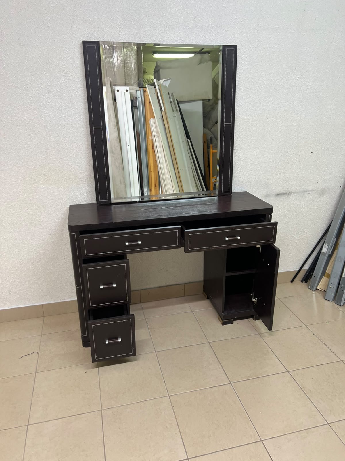 The image shows a brown wooden vanity table with an attached mirror and multiple drawers. - Image 9