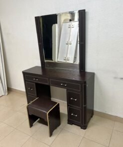 The image shows a brown wooden vanity table with an attached mirror and multiple drawers. - Image 8