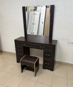 The image shows a brown wooden vanity table with an attached mirror and multiple drawers. - Image 17