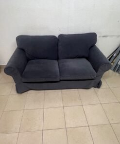 The IKEA EKTORP 2-seat sofa features a dark gray slipcover, a classic design, and comfortable, removable, and washable seat cushions. - Image 3