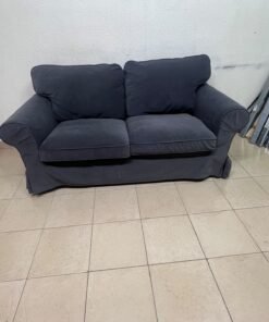 The IKEA EKTORP 2-seat sofa features a dark gray slipcover, a classic design, and comfortable, removable, and washable seat cushions. - Image 4
