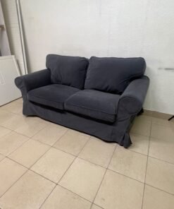 The IKEA EKTORP 2-seat sofa features a dark gray slipcover, a classic design, and comfortable, removable, and washable seat cushions. - Image 8