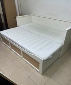 IKEA HEMNES daybed frame in white, featuring three built-in storage drawers.