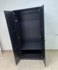 The RAKKESTAD two-door wardrobe from IKEA features a practical, simple design and measures approximately 79x176 cm; it comes in a black-brown finish. - Image 7
