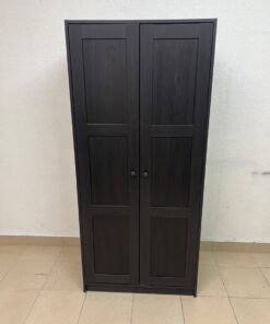 The RAKKESTAD two-door wardrobe from IKEA features a practical, simple design and measures approximately 79x176 cm; it comes in a black-brown finish. - Image 9