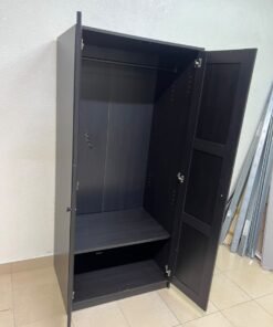 The RAKKESTAD two-door wardrobe from IKEA features a practical, simple design and measures approximately 79x176 cm; it comes in a black-brown finish. - Image 4
