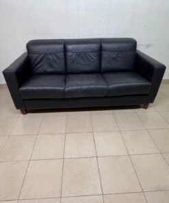 A modern three-seater black leather sofa featuring square armrests and wooden legs, resembling the IKEA "Skogaby" model. - Image 4