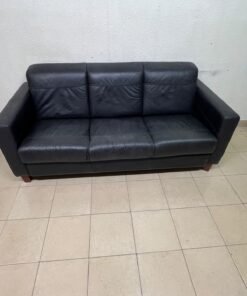 A modern three-seater black leather sofa featuring square armrests and wooden legs, resembling the IKEA "Skogaby" model. - Image 5