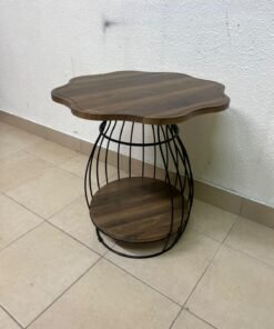 This modern two-tier side table features a wooden top with curved edges and a lower storage shelf enclosed by a black metal frame designed like a wire mesh cage. - Image 3