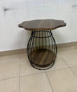This modern two-tier side table features a wooden top with curved edges and a lower storage shelf enclosed by a black metal frame designed like a wire mesh cage. - Image 6