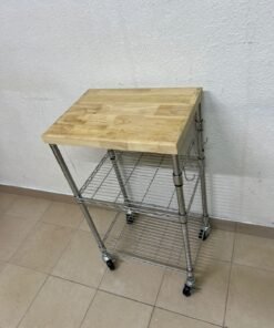 A multi-shelf kitchen cart made of chrome wire, featuring a light-colored wood top (butcher block style) and swivel casters. - Image 9