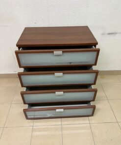 The IKEA HOPEN dark wood chest of drawers features four drawers with frosted glass fronts and silver-colored handles. - Image 3